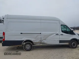 2023 Ford Transit Cargo z VIN 1FTBR3X87PKB82399, wystawiony jako IAAI lot #41368268 z przebiegiem 19 374 mil mil oraz . Historia ofert i sprzedaży dostępna na DreamBid. Obrazek 6.