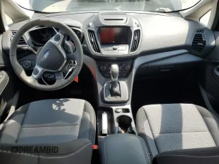 2018 Ford C-Max SE z VIN 1FADP5AU8JL105323, wystawiony jako Copart lot #55833125 z przebiegiem 59 463 mil mil oraz Szkody całkowita. Historia ofert i sprzedaży dostępna na DreamBid. Obrazek 8.