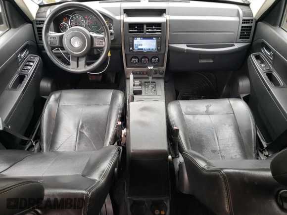 2012 Jeep Liberty Sport z VIN 1C4PJMAK6CW199947, wystawiony jako Copart lot #58485845 z przebiegiem 138 288 mil mil oraz Szkoda całkowita • Salvage title. Historia ofert i sprzedaży dostępna na DreamBid. Obrazek 8.