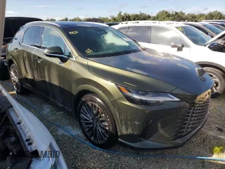 2023 Lexus RX with VIN 2T2BAMBA3PC001898, listed as a Copart auction lot 74104154 with 6,702 mi miles and Salvage Title. Bid and sale history available at carsss.com. Image 4.
