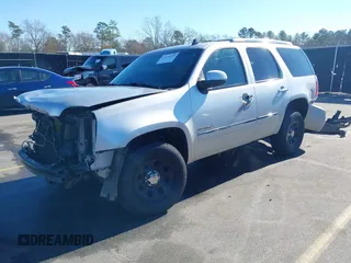 2011 GMC Yukon Denali with VIN 1GKS2EEF8BR346281, listed as a IAAI auction lot 41224127 with 264,311 mi miles. Bid and sale history available at carsss.com. Image 2.