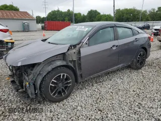 2017 Honda Civic LX z VIN 19XFC2F57HE032110, wystawiony jako Copart lot #58806095 z przebiegiem 118 194 mil mil oraz Szkoda całkowita • Salvage title. Historia ofert i sprzedaży dostępna na DreamBid. Obrazek 1.