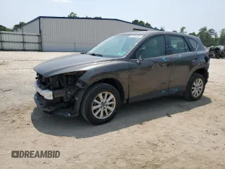 2016 Mazda CX-5 Sport z VIN JM3KE2BY2G0718532, wystawiony jako Copart lot #57965495 z przebiegiem 112 601 mil mil oraz Szkoda całkowita • Salvage title. Historia ofert i sprzedaży dostępna na DreamBid. Obrazek 1.