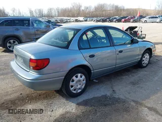 2002 Saturn SL z VIN 1G8ZH52892Z151119, wystawiony jako IAAI lot #41764757 z przebiegiem 82 017 mil mil oraz . Historia ofert i sprzedaży dostępna na DreamBid. Obrazek 4.