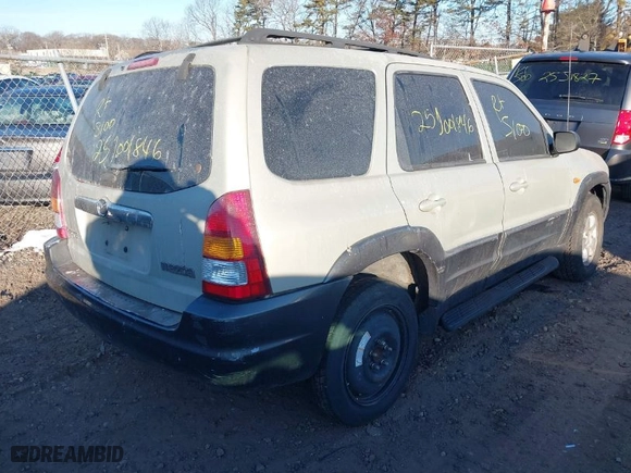 2004 Mazda Tribute LX with VIN 4F2YZ04114KM10120, listed as a IAAI auction lot 41637945 with 999,999 mi miles. Bid and sale history available at carsss.com. Image 4.
