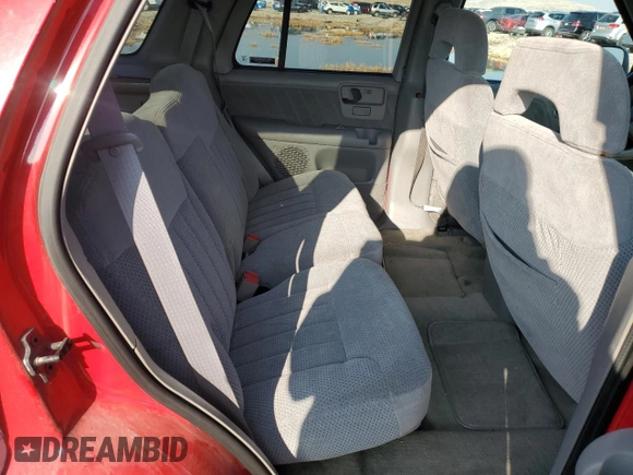 1995 Chevrolet Blazer z VIN 1GNDT13W4S2243226, wystawiony jako Copart lot #81429904 z przebiegiem 1 757 497 mil mil oraz Szkoda całkowita • Salvage title. Historia ofert i sprzedaży dostępna na DreamBid. Obrazek 11.