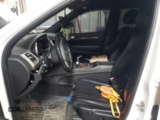 2015 Jeep Grand Cherokee Overland with VIN 1C4RJFCT9FC853324, listed as a Copart auction lot 88104655 with Not Provided miles and Salvage Title. Bid and sale history available at carsss.com. Image 7.