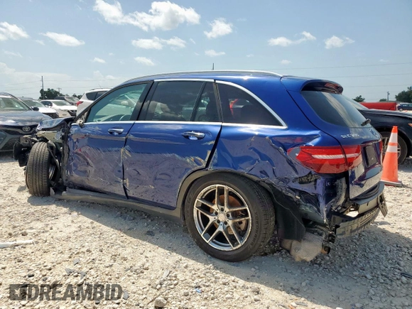2017 Mercedes-Benz GLC 300 with VIN WDC0G4JB2HF130125, listed as a Copart auction lot 61576685 with 94,643 mi miles and Salvage title. Bid and sale history available at DreamBid. Image 2.