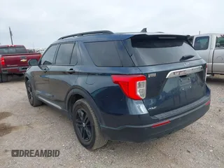 2023 Ford Explorer XLT with VIN 1FMSK7DH9PGB87649, listed as a IAAI auction lot 42271454 with 26,860 mi miles and . Bid and sale history available at DreamBid. Image 3.