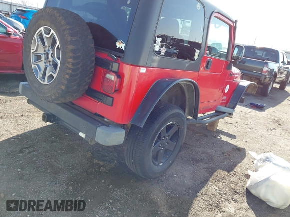 2004 Jeep Wrangler Sport Right Hand Drive with VIN 1J4F449S74P796957, listed as a IAAI auction lot 41987562 with 106,730 mi miles and . Bid and sale history available at carsss.com. Image 4.