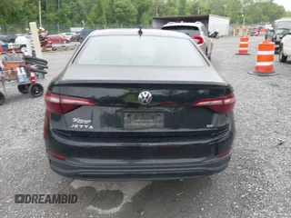 2023 Volkswagen Jetta SE z VIN 3VW7M7BUXPM061694, wystawiony jako IAAI lot #42231342 z przebiegiem 39 063 mil mil oraz . Historia ofert i sprzedaży dostępna na DreamBid. Obrazek 16.