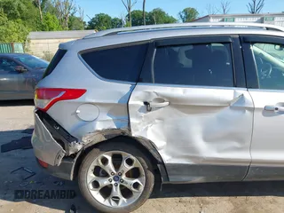 2016 Ford Escape Titanium with VIN 1FMCU9J97GUB91966, listed as a IAAI auction lot 42378829 with 121,218 mi miles and . Bid and sale history available at DreamBid. Image 6.