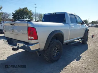 2015 Ram 2500 SLT with VIN 3C6UR5DL5FG664542, listed as a IAAI auction lot 41364516 with 161,984 mi miles. Bid and sale history available at carsss.com. Image 4.