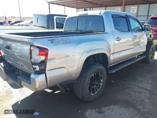 2021 Toyota Tacoma 2WD SR with VIN 5TFAX5GN9MX192241, listed as a IAAI auction lot 41323346 with 20,138 mi miles. Bid and sale history available at carsss.com. Image 4.