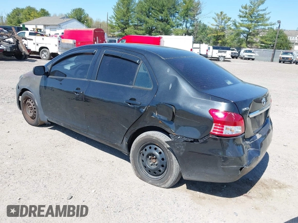 2009 Toyota Yaris with VIN JTDBT903294057773, listed as a IAAI auction lot 42071027 with 164,128 mi miles. Bid and sale history available at carsss.com. Image 3.