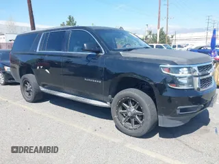 2015 Chevrolet Suburban LT with VIN 1GNSCJKC2FR281629, listed as a IAAI auction lot 41849300 with 133,842 mi miles. Bid and sale history available at carsss.com. Image 1.