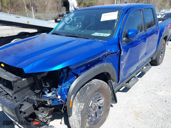 2025 Nissan Frontier PRO-4X with VIN 1N6ED1EK0SN614348, listed as a IAAI auction lot 41826627 with 6,931 mi miles. Bid and sale history available at carsss.com. Image 18.