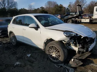 2016 Porsche Cayenne with VIN WP1AA2A29GKA13338, listed as a Copart auction lot 42319275 with 122,980 mi miles and Salvage Title. Bid and sale history available at carsss.com. Image 4.
