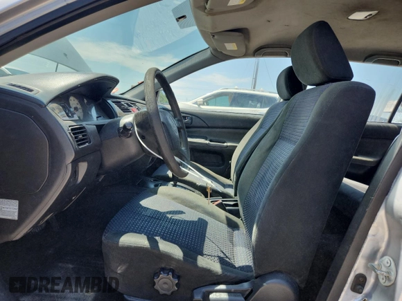 2004 Mitsubishi Lancer z VIN JA3AD29F34U045488, wystawiony jako Copart lot #61493005 z przebiegiem 230 611 mil mil oraz Czysty tytuł • Clean title. Historia ofert i sprzedaży dostępna na DreamBid. Obrazek 7.