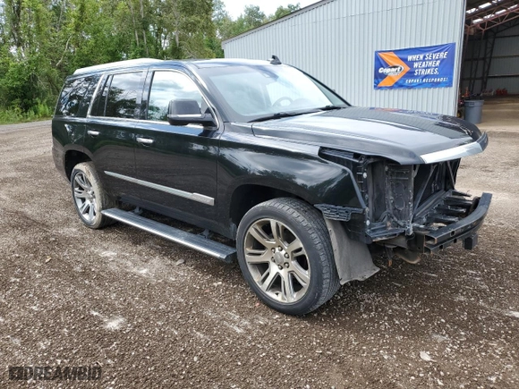 2015 Cadillac Escalade Premium with VIN 1GYS4NKJ5FR650621, listed as a Copart auction lot 66966264 with 141,517 mi miles and Salvage Title. Bid and sale history available at carsss.com. Image 4.