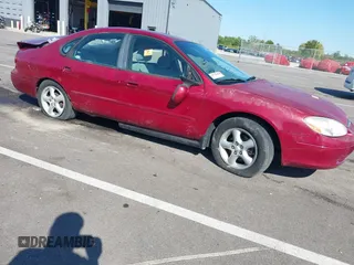 2003 Ford Taurus SE Standard with VIN 1FAFP53U93A240461, listed as a IAAI auction lot 37581480 with 200,000 mi miles. Bid and sale history available at carsss.com. Image 1.