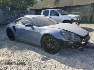 2023 Porsche 911 Turbo with VIN WP0AD2A94PS257369, listed as a Copart auction lot 48727904 with 6,700 mi miles. Bid and sale history available at carsss.com. Image 4.