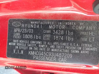 2003 Hyundai Accent GL with VIN KMHCG45C93U487209, listed as a IAAI auction lot 41590636 with 118,811 mi miles. Bid and sale history available at carsss.com. Image 9.