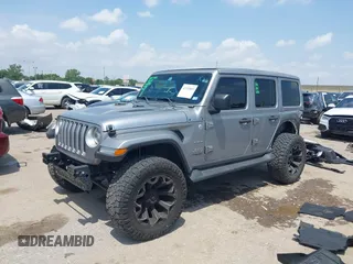 2021 Jeep Wrangler Unlimited High Altitude with VIN 1C4HJXEG3MW511185, listed as a IAAI auction lot 42125883 with 45,564 mi miles and . Bid and sale history available at DreamBid. Image 17.