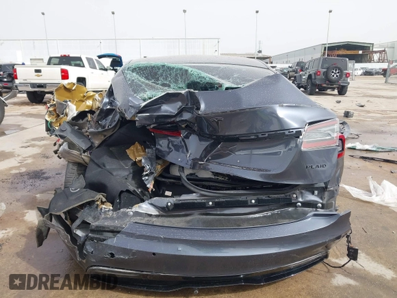 2021 Tesla Model S Plaid z VIN 5YJSA1E6XMF429436, wystawiony jako IAAI lot #41826114 z przebiegiem Nie podano mil oraz . Historia ofert i sprzedaży dostępna na DreamBid. Obrazek 16.