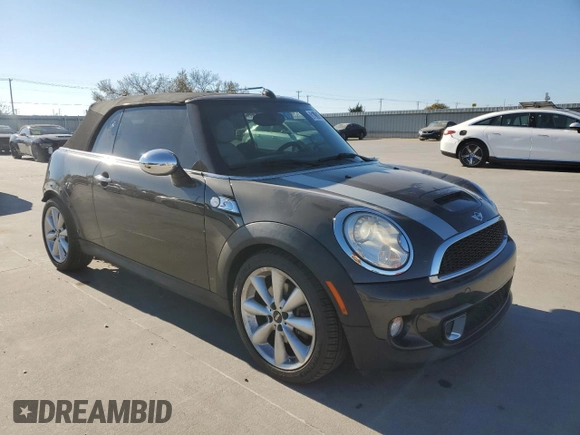 2014 MINI Convertible S with VIN WMWZP3C58ET706941, listed as a Copart auction lot 81900674 with 61,292 mi miles and Salvage title. Bid and sale history available at DreamBid. Image 4.
