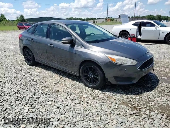 2016 Ford Focus SE with VIN 1FADP3F29GL233719, listed as a Copart auction lot 56857705 with 140,785 mi miles and Salvage title. Bid and sale history available at DreamBid. Image 14.