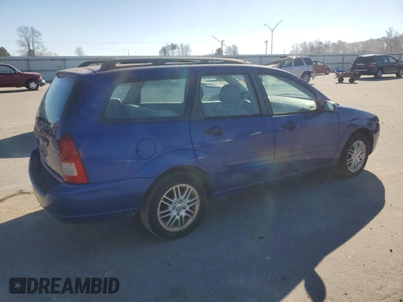 2005 Ford Focus SE with VIN 1FAHP36N05W134830, listed as a Copart auction lot 41696485 with 250,582 mi miles and Salvage Title. Bid and sale history available at carsss.com. Image 3.