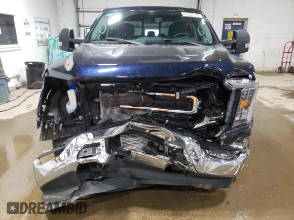 2023 Ford F-150 XL with VIN 1FTEW1EP5PFB04068, listed as a Copart auction lot 57957125 with 40,809 mi miles and Salvage title. Bid and sale history available at DreamBid. Image 5.