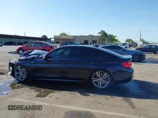 2015 BMW 4 Series 435i with VIN WBA4B1C54FD418309, listed as a IAAI auction lot 42099401 with 119,982 mi miles and . Bid and sale history available at carsss.com. Image 14.