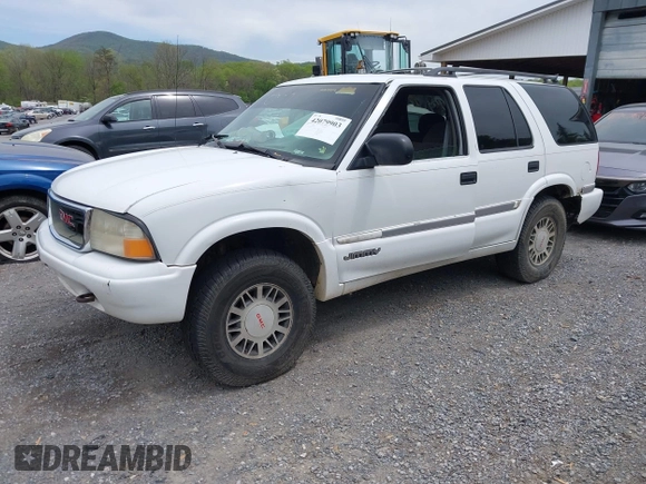 1999 GMC Jimmy SLE with VIN 1GKDT13WXX2521082, listed as a IAAI auction lot 42079903 with 160,055 mi miles. Bid and sale history available at carsss.com. Image 2.
