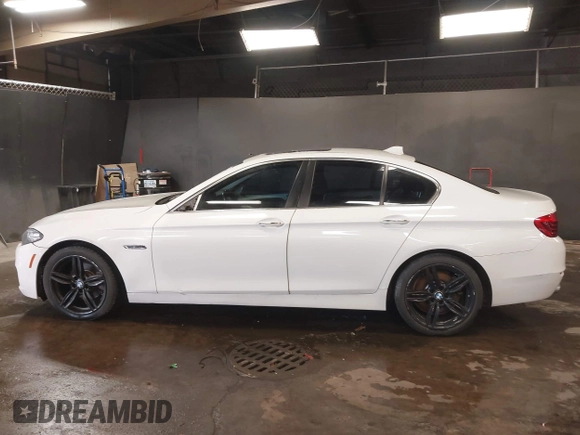 2014 BMW 5 Series 528i xDrive with VIN WBA5A7C57ED612230, listed as a IAAI auction lot 41586318 with 148,676 mi miles and . Bid and sale history available at DreamBid. Image 14.