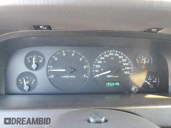 1999 Jeep Grand Cherokee Laredo with VIN 1J4GW58N4XC739465, listed as a Copart auction lot 76130544 with 195,649 mi miles and Salvage title. Bid and sale history available at DreamBid. Image 9.