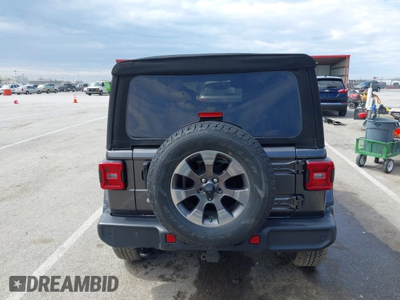 2019 Jeep Wrangler Unlimited Sahara with VIN 1C4HJXEN3KW622167, listed as a IAAI auction lot 41880702 with 72,928 mi miles and . Bid and sale history available at DreamBid. Image 17.