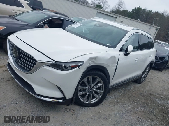 2016 Mazda CX-9 Grand Touring with VIN JM3TCADY0G0113779, listed as a IAAI auction lot 41466750 with 58,035 mi miles and . Bid and sale history available at DreamBid. Image 2.