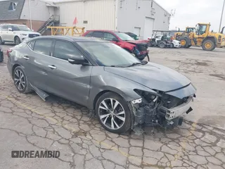 2017 Nissan Maxima S with VIN 1N4AA6AP1HC361740, listed as a IAAI auction lot 40868494 with 90,607 mi miles and . Bid and sale history available at DreamBid. Image 1.