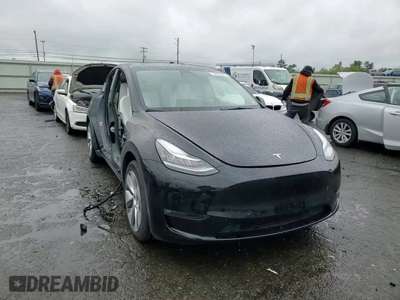 2022 Tesla Model Y Long Range z VIN 7SAYGDEE0NF327147, wystawiony jako Copart lot #58422885 z przebiegiem 39 021 mil mil oraz Szkody całkowita. Historia ofert i sprzedaży dostępna na DreamBid. Obrazek 14.
