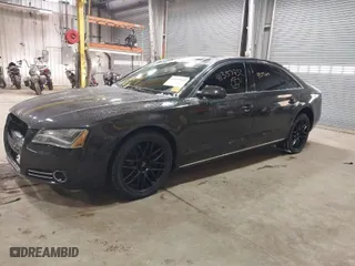 2012 Audi A8 L with VIN WAURVAFD6CN014546, listed as a IAAI auction lot 41357932 with 93,516 mi miles. Bid and sale history available at carsss.com. Image 2.
