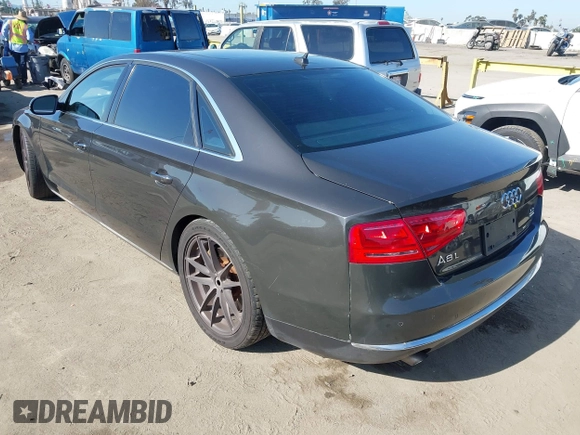 2011 Audi A8 with VIN WAURVAFD9BN014362, listed as a IAAI auction lot 41960366 with 135,244 mi miles and . Bid and sale history available at DreamBid. Image 3.