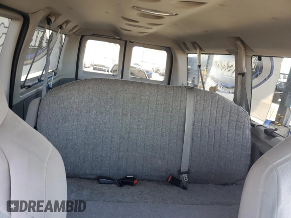 2010 Ford Econoline Passenger XL with VIN 1FMNE1BW3ADA25124, listed as a Copart auction lot 56899235 with 244,010 mi miles and Salvage title. Bid and sale history available at DreamBid. Image 10.