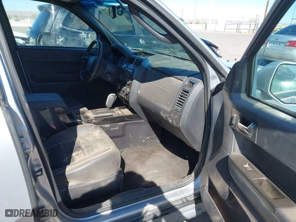 2010 Ford Escape Limited with VIN 1FMCU9EG8AKB12610, listed as a IAAI auction lot 41834872 with 214,218 mi miles. Bid and sale history available at carsss.com. Image 5.