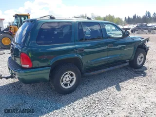 1999 Dodge Durango with VIN 1B4HS28Z3XF521133, listed as a IAAI auction lot 42068475 with 229,651 mi miles. Bid and sale history available at carsss.com. Image 4.