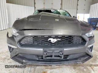 2020 Ford Mustang EcoBoost z VIN 1FA6P8TH7L5159827, wystawiony jako Copart lot #61649665 z przebiegiem 59 453 mil mil oraz Czysty tytuł • Clean title. Historia ofert i sprzedaży dostępna na DreamBid. Obrazek 5.