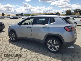 2020 Jeep Compass Limited with VIN 3C4NJCCB3LT128807, listed as a Copart auction lot 56673705 with 94,903 mi miles and Salvage title. Bid and sale history available at DreamBid. Image 2.