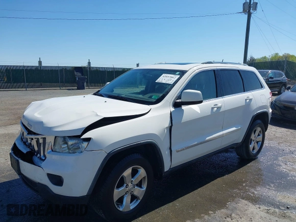 2011 Jeep Grand Cherokee Laredo with VIN 1J4RR4GG3BC736370, listed as a IAAI auction lot 42053862 with 169,269 mi miles and . Bid and sale history available at DreamBid. Image 2.