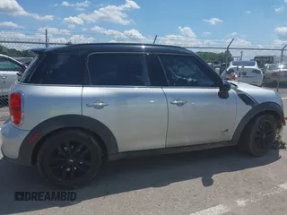 2011 MINI Countryman S with VIN WMWZC5C53BWL53641, listed as a IAAI auction lot 42547084 with 171,647 mi miles and . Bid and sale history available at DreamBid. Image 13.